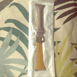 Grey leather Fitbit Versa band